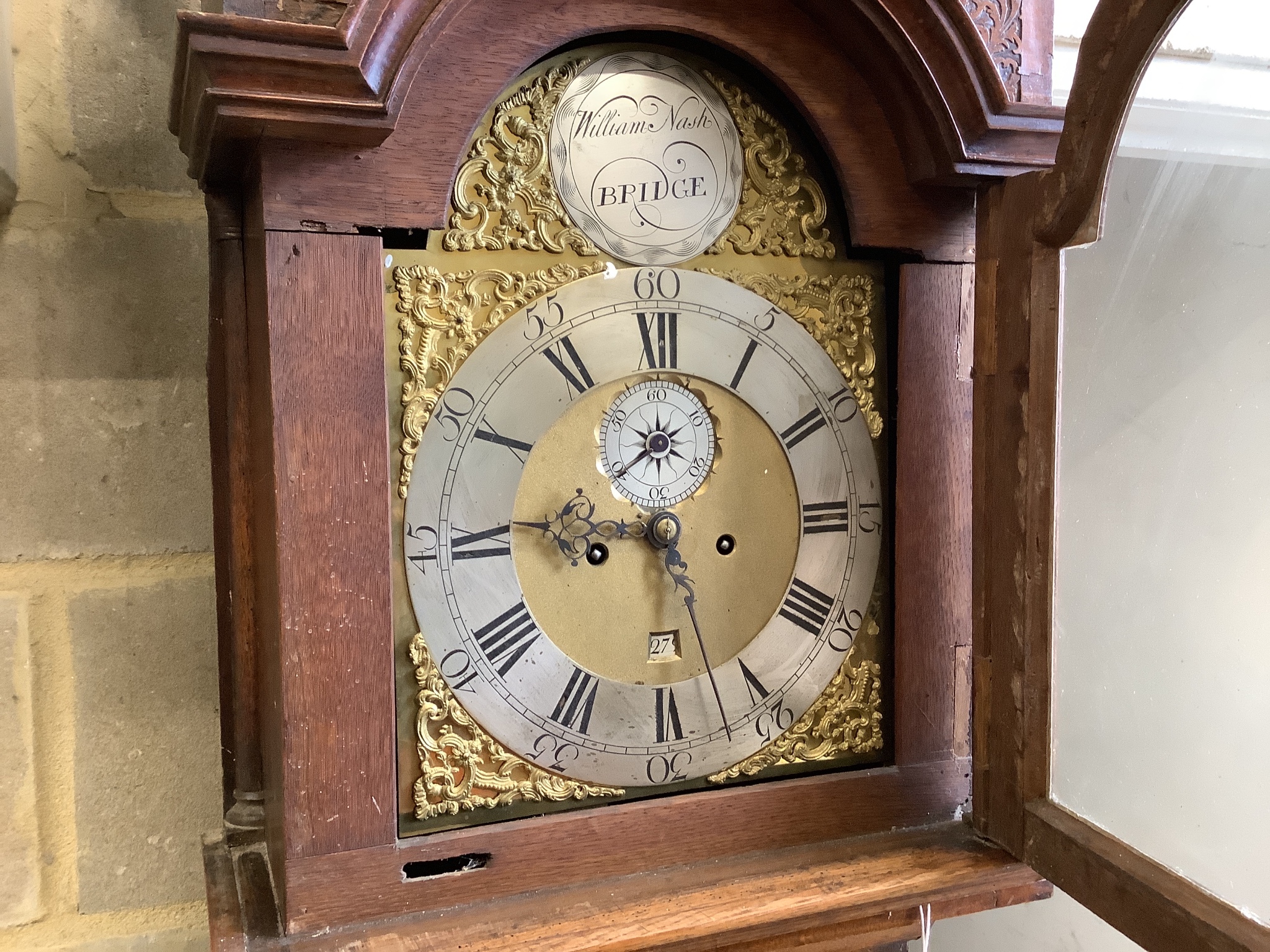 A George III oak eight day longcase clock, marked William Nash Bridge, height 210cm